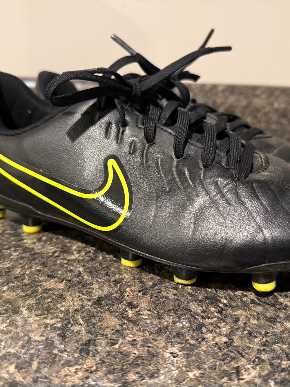 Nike Boy’s Black Soccer Cleats with Neon Yellow Accent